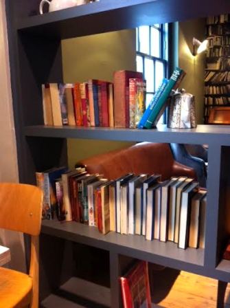 Swapping books in a cosy coffee shop